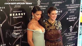 (VIDEO) Adriana Lima BOOBS SPILL OUT!!