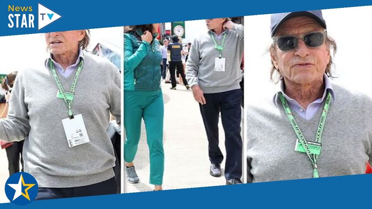 Michael Douglas, 77, looks sprightly as he gets into passionate chat at British Grand Prix