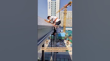 The Daring Descent of a Window Cleaner