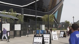 Divided voters in Las Vegas weighed a stark choice for the nation's presidential future