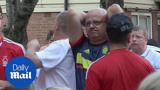 England fans go through the motions during Belgium defeat