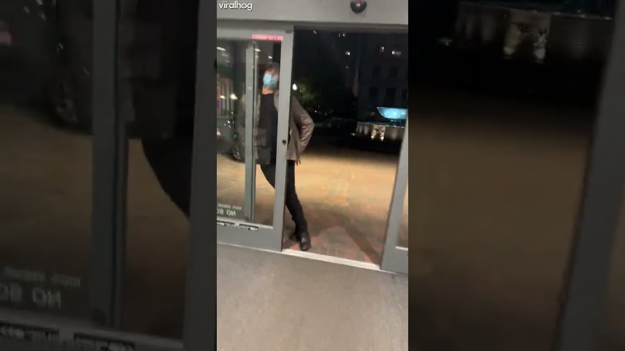 Man Walks Right Into Sliding Door 