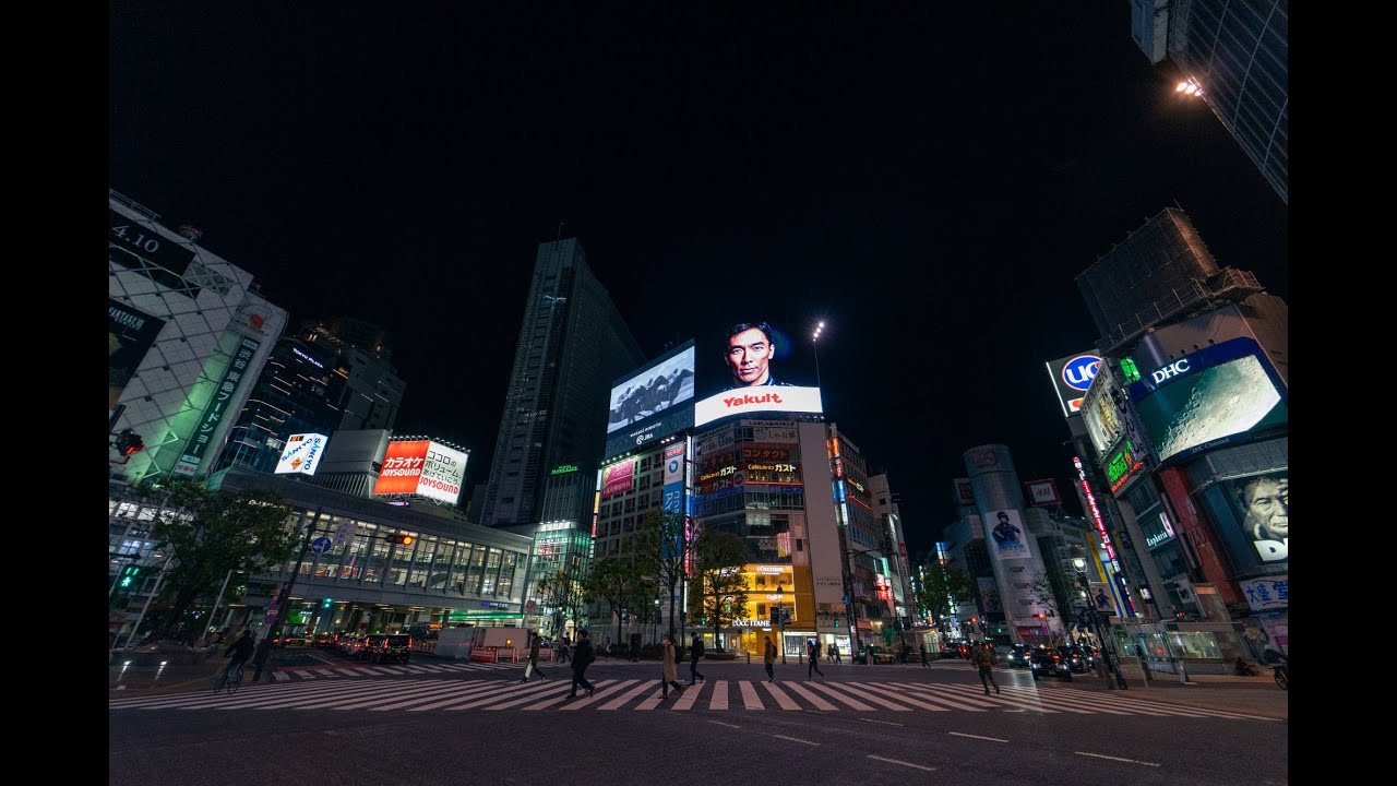 walking the empty streets of Tokyo while blaring electronica