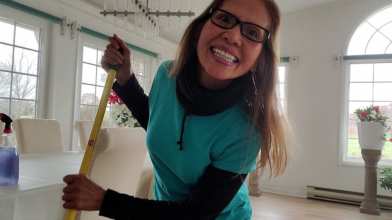 Mopping the floor and dancing with my mop.