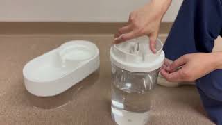 Filling up Richell's Water Feeder