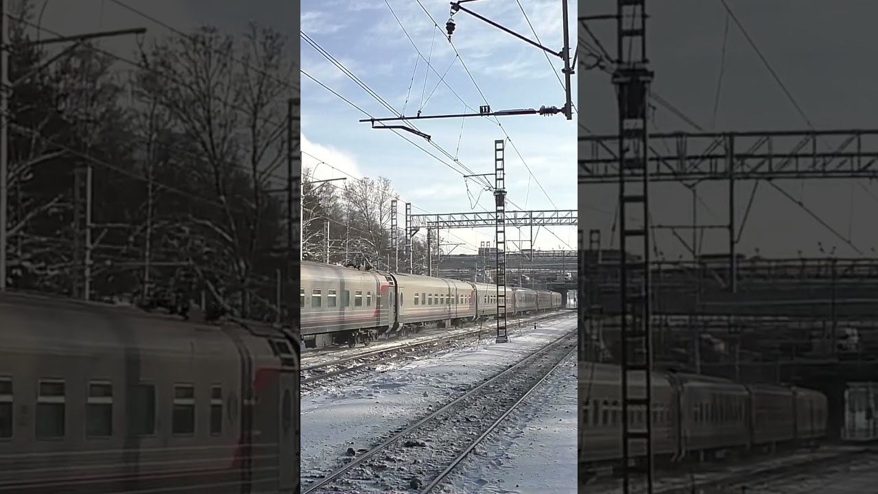 Электровоз ЭП2К-371 (ТЧЭ-6) со скорым поездом № 078С Симферополь — Санкт-Петербург.