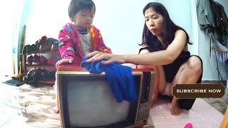 Mom of Sam - she cleans the television.