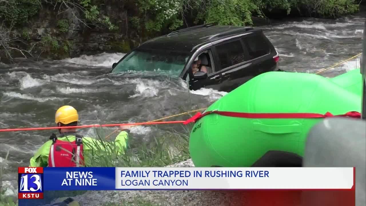 Family rescued after car plunges into Logan River - YouTube