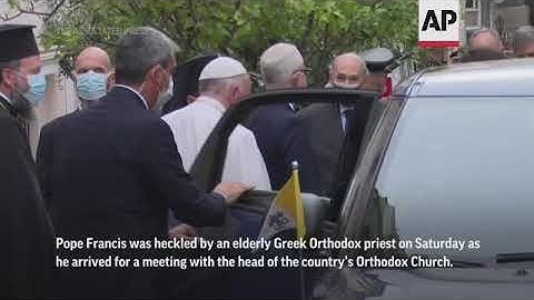 Police subdue priest who shouted 