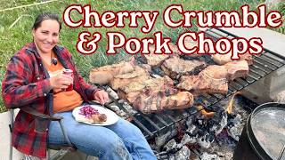 Dutch Oven Cherry Dessert over the fire.