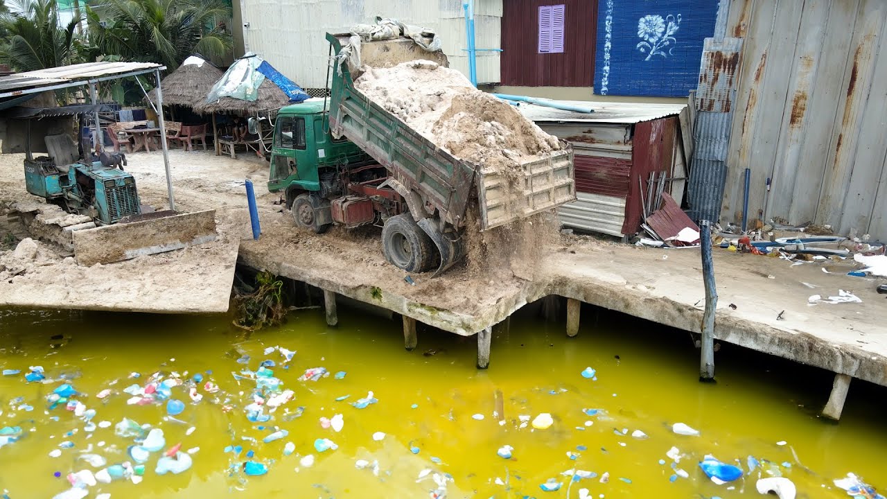 Start Awesome Bulldozer and Trucks to remove mini lake and many Aquatic plants