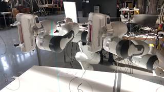 Motion planning and coordination of multiple robotic arms