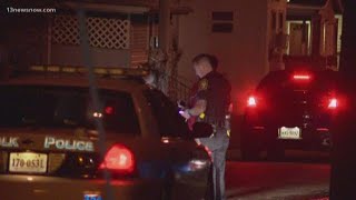 Woman shot after bullets go through front door, Suffolk police investigate