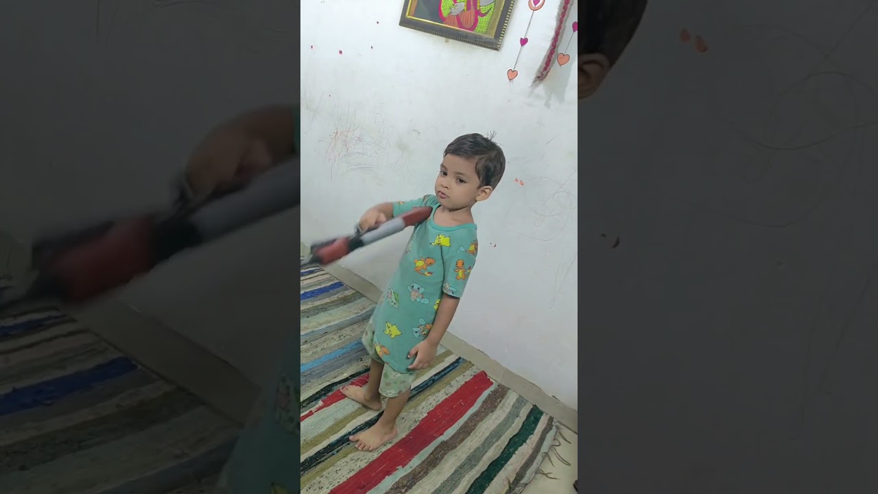 Cute Baby With Gun 