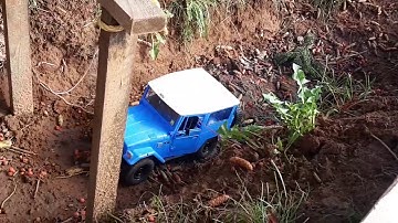 Wpl c34 on the backyard crawler course.