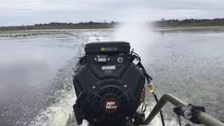 23hp Mud Walker Surface Drive running the duck hole.