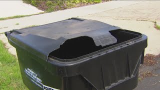 Who pays the price when a city trash truck mangles a bin?