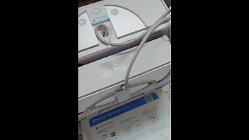 Ecovacs Winbot W2 window cleaning robot - Reeling back the cord