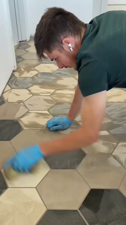 Coating the mortar and then leveling it on the paving slabs that have already been installed #shorts