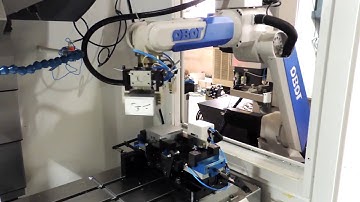 Robot Automation: VMC Auto part loading system