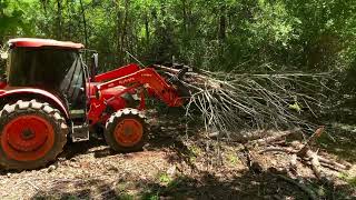Road completely blocked with fallen trees... until we hooked up the Land Pride Grapple!