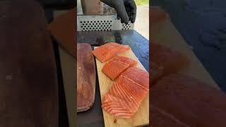 Garlic Parmesan Crusted Salmon on a Cedar Plank. Cheesy, crispy, moist and SO delicious. #asmr