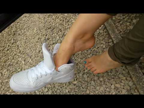 Shoeplay in her Nike Son of Force sockless