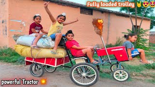 Homemade mini tractor pulling fully loaded trolley with wheat straw | DIY tractor |