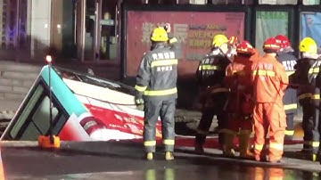 Bus crashes into sinkhole as road collapses in Xining City