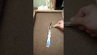 melts metal into molds knife sword