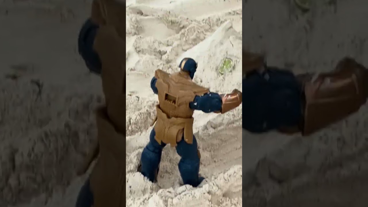 Thanos and Superman fight on the beach