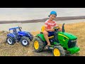 Darius helps tractor playing rescuing team for tractors  kidscoc club