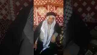 صدام حسين رحمة الله مع أسير إيراني سرسري