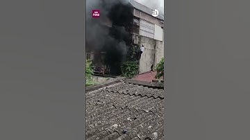 Xúc động hình ảnh thanh niên leo mái nhà cõng 2 cô gái thoát khỏi đám cháy ở Hà Nội | VTC Now