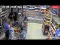 Brave female shop worker fights off armed robber