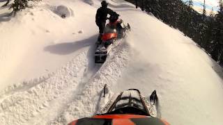 Max Breaking Trail with Flair on his snowmobile