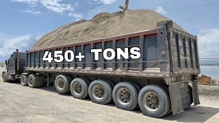 TRUCKS OFFLOADING 7,500 TONS OF SAND & GRAVEL  ONTO THE BARGE S5•E6