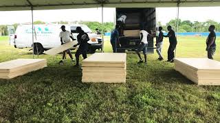 Guys unloading a truck time lapse