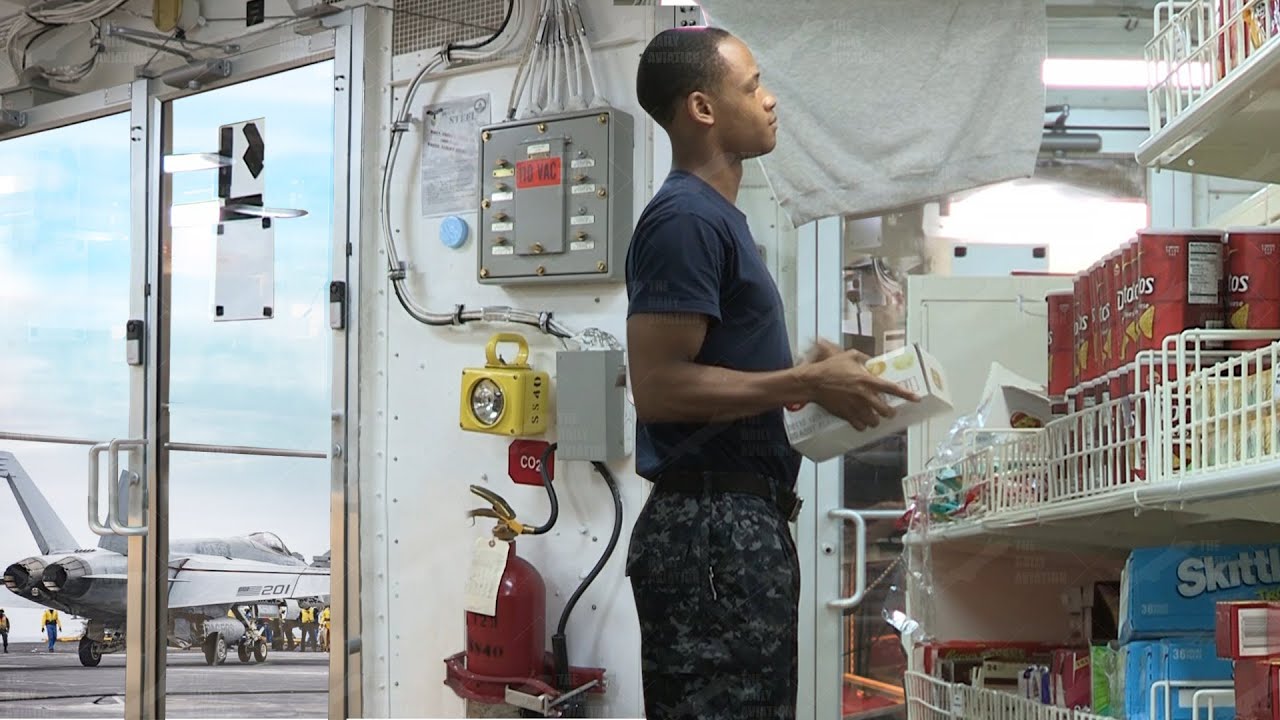 US Navy Sailors Shopping Inside Aircraft Carrier