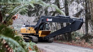 North Americas first Semi Autonomous long reach...350G
Segment 1 - TO THE SHIPYARD
This series tells a unique story of North Americas first Auto long reach excavator.
During its 1800km journey across Western Canada on a 65 ton trailer manufactured by Brandt Tractor, I caught up with it in Abbotsford BC. This is where I begin to tell its story.
The excavator has already travelled 1500kms, but the last leg of the journey is where all of the fun begins. It still has to get to the shipyard and board a commercial barge that will float it across the Pacific, then travel through a rain forest.
In this video the excavator travels from Abbotsford to the Sea Span shipyard on the Vancouver coast.
Segment 2 - CROSSING THE PACIFIC
There was only one way to get the auto excavator to Vancouver island, and thats with a commercial barge that specializes in floating heavy truck cargo.
Traveling from Vancouver to the port of Nanaimo was only around 80kms, but it took the barge roughly 4 hours to cross this stretch of the Canadian Pacific ocean with the auto excavator as its precious cargo.
The journey of this excavator took me on one heck a wild story telling adventure.
Segment 3 - THE ISLAND
The excavator has landed at the Port of Nanaimo British Columbia right on schedule, but were not done yet.
The sun is going down and we still have to make it to the job site in Port Alberni before it gets too late...With @nathandjk behind the wheel, we drive through the rain forest deep into a red wood territory. The trees tower over 100 feet high in places, and the highway is narrow with sharp corners and lots of car traffic.
This is where the Brandt manufactured heavy haul trailer makes a name for its self. The hills and corners are a breeze with this trailer as its equipped with all wheel DISK BRAKES.
Segment 4 - LATE NIGHT DELIVERY
Welcome to Port Alberni and 1800kms later...This where Kelsey pipelines just received their one of a kind long reach auto excavator from @brandtgroupofcompanies
Theres more than just fog in the air, there is also excitement and anticipation to get this machine out to sea and digging blind underwater... But first we need to unload it in the dark.
Segment 5 - WALKING OUT TO SEA
Welcome to Port Alberni, its 7am and its time to walk the excavator through the rain forest and to its barge, the one it will work from... With camera in hand, I walked with it the whole way, a few kms. Snapping pictures, trying filming it, posting Instagram stories, trying to plan what shots I need, and how the heck I am going to put this whole story together for this video, plus a full chasing dirt episode...Thats actually quite hard to do all at once, but after all this is what I do full time so Ive learned how to multi task efficiently... When we arrived at the shoreline with the excavator, it didnt take long before Justin Ermel gave the executive orders to load it on the barge and get it digging ASAP. (Justin is one of the owners of Kelsey Pipelines.)
Segment 6 - THE AUTO EXCAVATOR
Well folks, after 1800kms from a Brandt manufacturing facility in Regina, all the way to Port Alberni British Columbia. This first of its kind excavator has been delivered to the customer, Kelsey Pipelines.
The reason why this excavator is so special is because its Semi Autonomous. Equipped with Topcons latest Auto excavator GPS system, it also has Topcons state of the art adaptive joystick controls. Meaning this machine has the ability to calculate and make its own decisions based on changing real world conditions. Like what type of digging the machine is doing. From light trimming to aggressive bucket fill. Yep, you heard that right, this machine adapts through the GPS system.
During this storytelling journey, I learned alot about Brandt tractor. What I learned was, they are basically the definition of a one stop shop. A dealer that also thinks like a manufacturer, because they are one. Where else can you go and have your dealer do the following: Sale, service and repair of the excavator. Built a custom long reach configuration along with a custom bucket, all from scratch so it specifically meets the needs of the customer. They also Sold and installed the whole GPS system. Plus building 3D models for the jobsite, and even training to go along with it. Let me add that all of that comes with 24 hour technical support for every part on the machine including the GPS system. On top of all of that, it got delivered on a Brandt built lowbed trailer.
How did you like the video? leave a comment and subscribe.
For business inquiries, please contact me through Pushysix.com North Americas first Semi Autonomous long reach...350G
