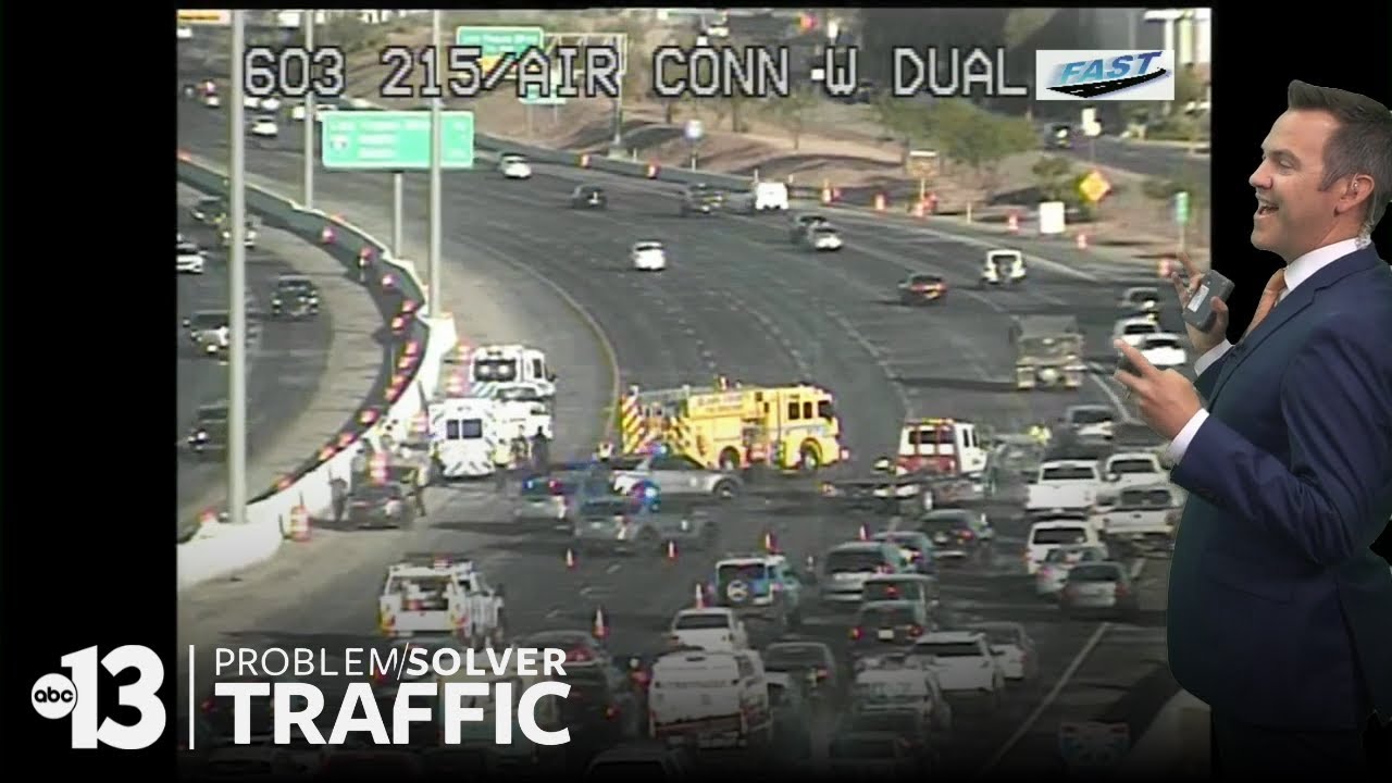 Crash causing traffic backups on 215 near airport connector
