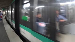Paris Metro Line M4 train arriving at Barbès Rochechouart