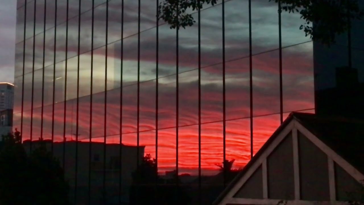 SUNRISE RED WEST PERTH WINDOW REFLECTION