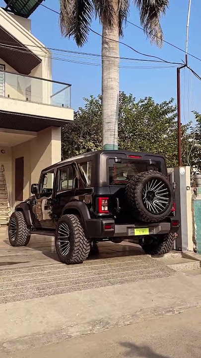 Thar ROXX modified black colour with 22 inch Alloys wheels