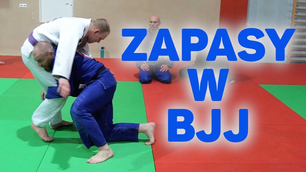 Sprowadzenie do parteru chwytem za dwie nogi.