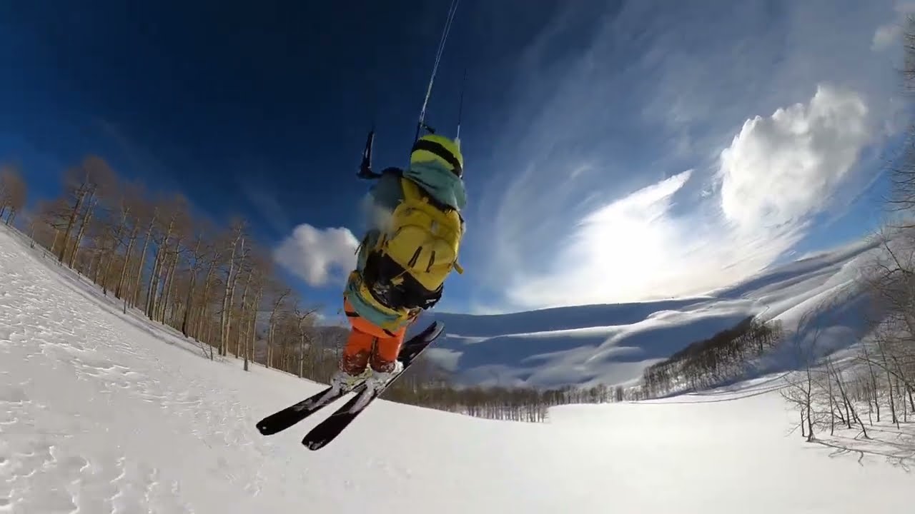 Floating in, Gliding above Powder with Snowkite. 