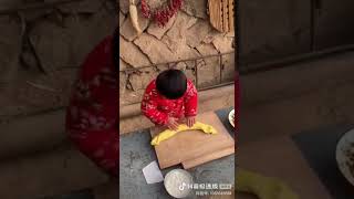 3 year old Chinese kid makes dumplings