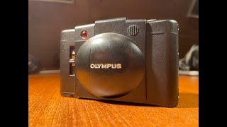 How to use an Olympus XA2, How to load & unload film and main functions.