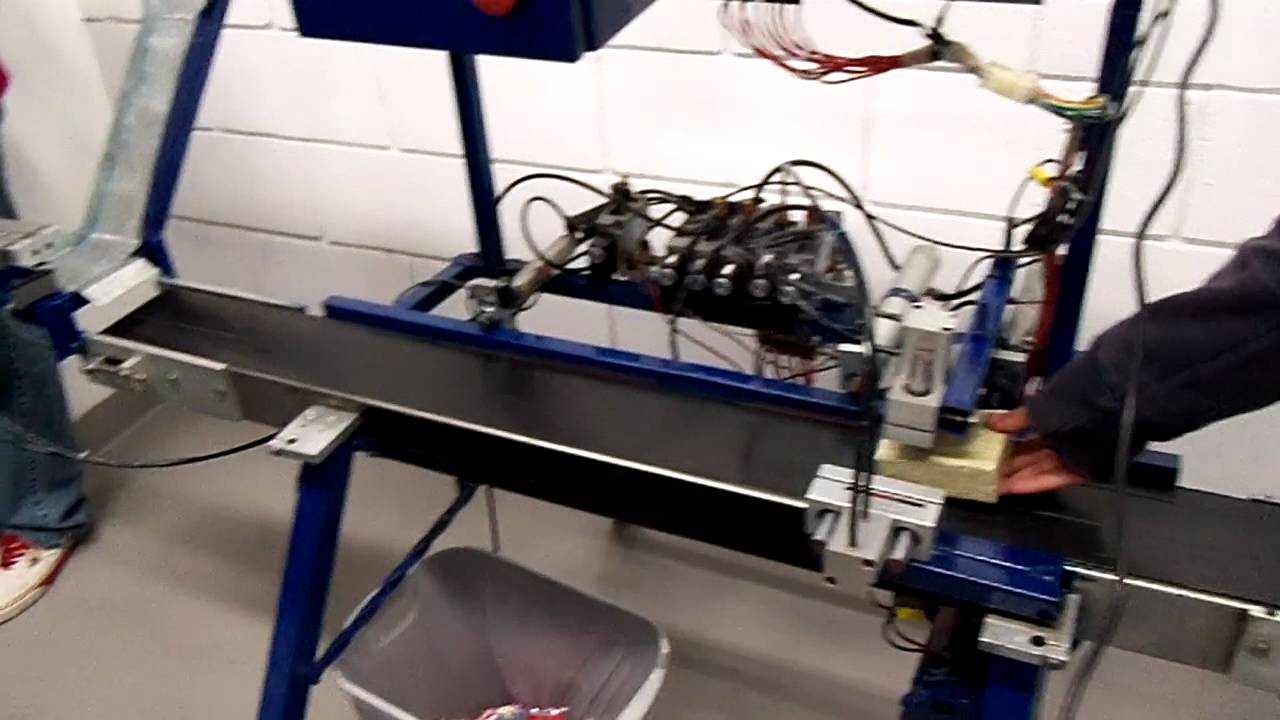 Stamping machine process using allen bradley slc500 plc. YouTube