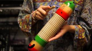 Kinder Musikinstrument Fisch Ton Block Guiro Percussion Set Ei Glocken 